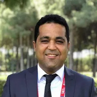 Prof. Dr. Oğuz Kuşcu — Kulak Burun Boğaz, Ankara. Portre fotoğrafı.