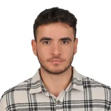 Psk. Dan. Taha Yıldız — Psikolojik Danışma ve Rehberlik. Portre fotoğrafı.