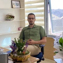 Uzm. Dr. Tufan Güneş — Psikiyatri, Balıkesir. Portre fotoğrafı.
