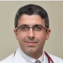 Doç. Dr. Kemal Ağbaht — İskenderun, Hatay. Portre fotoğrafı.