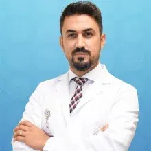Doç. Dr. Muhammet Arif Özbek — Beyin Ve Sinir Cerrahisi, İstanbul. Portre fotoğrafı.