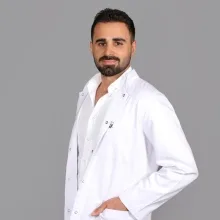 Uzm. Dr. Mihrali Karademir — Psikiyatri, Balıkesir. Portre fotoğrafı.