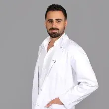 Uzm. Dr. Mihrali Karademir — Psikiyatri, Balıkesir. Portre fotoğrafı.