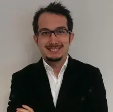 Doç. Dr. Erhan Dilber — Denizli. Portre fotoğrafı.