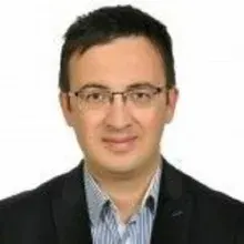 Uzm. Dr. Azad Asafov — Çocuk ve Ergen Psikiyatrisi, Elazığ. Portre fotoğrafı.