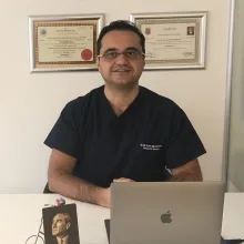 Dr. Dt. Erbil Şahinkaya — Ankara. Portre fotoğrafı.