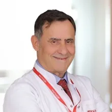 Uzm. Dr. Ekrem Erkan — Çocuk Sağlığı Ve Hastalıkları, Adana. Portre fotoğrafı.