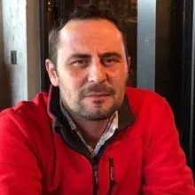 Prof. Dr. Oğuz Güçlü — Kulak Burun Boğaz, Çanakkale. Portre fotoğrafı.