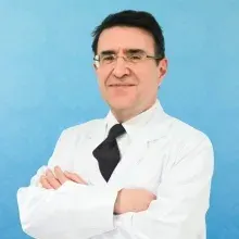Prof. Dr. Nejat Akalan — Beyin Ve Sinir Cerrahisi, İstanbul. Portre fotoğrafı.
