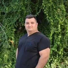 Dr. Can Kalkan — Pratisyen, Adana. Portre fotoğrafı.