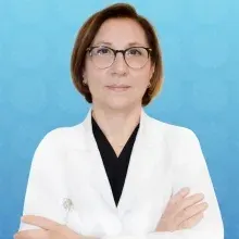 Op. Dr. Ayfer Özbek — Kadın Hastalıkları Ve Doğum, İstanbul. Portre fotoğrafı.