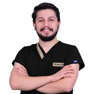 Dt. Berat Mazlum Peker — Diş Hekimi. Portre fotoğrafı.
