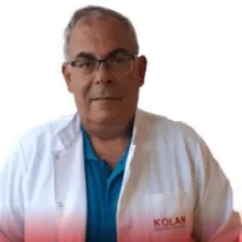 Op. Dr. Turgut Küçük — Genel Cerrahi. Portre fotoğrafı.