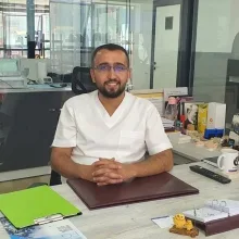 Dt. Erkan Şekerci — Diş Hekimi, Malatya. Portre fotoğrafı.