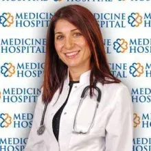 Uzm. Dr. Tuba Acet — Kadın Hastalıkları Ve Doğum. Portre fotoğrafı.