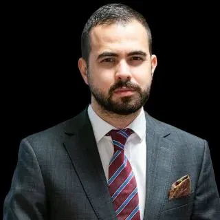 Dr. Fevzi Kunter Erten — Plastik Rekonstrüktif Ve Estetik Cerrahi, İstanbul. Portre fotoğrafı.