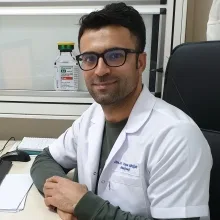 Uzm. Dr. Yaşar Birişik — Radyoloji. Portre fotoğrafı.