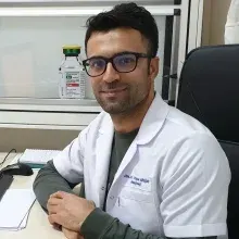Uzm. Dr. Yaşar Birişik — Radyoloji. Portre fotoğrafı.