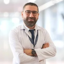 Uzm. Dr. Murat Esin — Kardiyoloji, Muratpaşa, Antalya. Portre fotoğrafı.