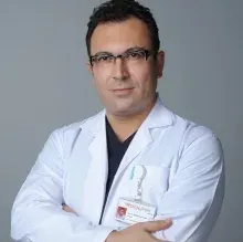 Op. Dr. Mehmet Tahir Şam — Göz Hastalıkları, Antalya. Portre fotoğrafı.