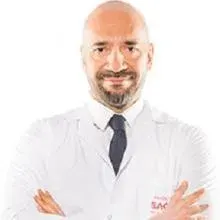 Op. Dr. Fahri Karaca — Çocuk Cerrahisi. Portre fotoğrafı.