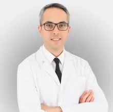 Doç. Dr. Hamdi Taşlı — Kulak Burun Boğaz, Mezitli, Mersin. Portre fotoğrafı.