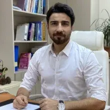 Doç. Dr. Uğur Tekin — Çocuk ve Ergen Psikiyatrisi, İstanbul. Portre fotoğrafı.