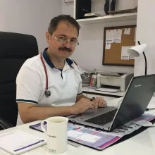 Doç. Dr. Emin Mete — Denizli. Portre fotoğrafı.
