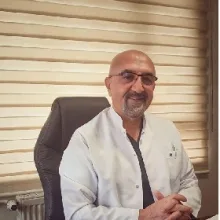 Uzm. Dr. Mehmet Bahçeci — Bursa. Portre fotoğrafı.