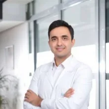 Op. Dr. Okan Taşkın — Göz Hastalıkları, Manisa. Portre fotoğrafı.