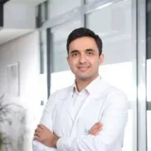 Op. Dr. Okan Taşkın — Göz Hastalıkları, Manisa. Portre fotoğrafı.