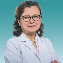 Doç. Dr. Aysun Karabulut — Kadın Hastalıkları Ve Doğum. Portre fotoğrafı.