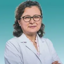 Doç. Dr. Aysun Karabulut — Kadın Hastalıkları Ve Doğum. Portre fotoğrafı.