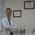 Dt. Ozan Küçük — Diş Hekimi, Mersin. Portre fotoğrafı.
