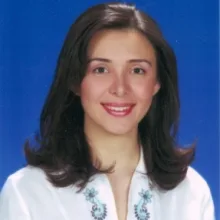 Uzm. Dr. Çiğdem Cura Yaygın — Psikiyatri, İzmir. Portre fotoğrafı.