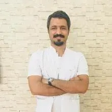Dt. Serkan Sayyiğit — Diş Hekimi, Van. Portre fotoğrafı.