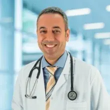 Prof. Dr. Doğan Erdoğan — Kardiyoloji, Antalya. Portre fotoğrafı.