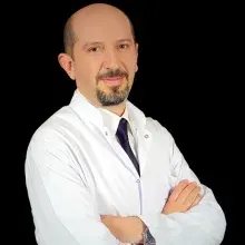 Prof. Dr. Emre Bozkırlı — Endokrinoloji Ve Metabolizma Hastalıkları, Adana. Portre fotoğrafı.
