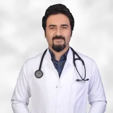 Uzm. Dr. Hasan Açık — İç Hastalıkları, Tuzla, İstanbul. Portre fotoğrafı.