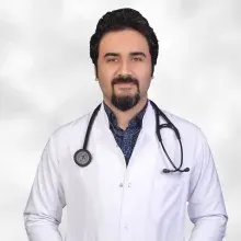 Uzm. Dr. Hasan Açık — İç Hastalıkları, Tuzla, İstanbul. Portre fotoğrafı.