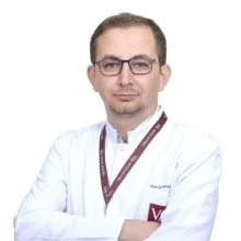 Uzm. Dr. Cemalettin Güneş — Çocuk Sağlığı Ve Hastalıkları, Bursa. Portre fotoğrafı.