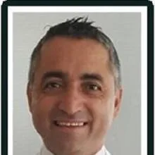Prof. Dr. Özgür Duman — Çocuk Nörolojisi, Konyaaltı, Antalya. Portre fotoğrafı.