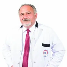Uzm. Dr. Şefik Tarlan — Göğüs Hastalıkları, Denizli. Portre fotoğrafı.