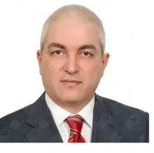 Prof. Dr. Oğuz Koç — Genel Cerrahi, Bakırköy, İstanbul. Portre fotoğrafı.