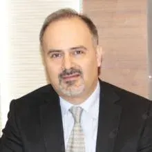 Uzm. Dr. Kamil Kutlay — İstanbul. Portre fotoğrafı.