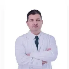 Prof. Dr. Rauf Oğuzhan Kum — Kulak Burun Boğaz, Çankaya, Ankara. Portre fotoğrafı.