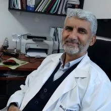 Dr. Ali Gürbaz — Pratisyen, Adana. Portre fotoğrafı.