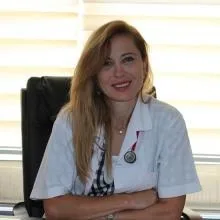 Op. Dr. Neslihan Gürbüz — Kadın Hastalıkları Ve Doğum, İzmir. Portre fotoğrafı.