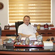 Prof. Dr. Aydın Şanlı — Göğüs Cerrahisi, İzmir. Portre fotoğrafı.