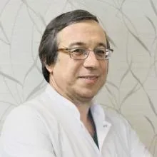 Prof. Dr. Sıtkı Tuzlalı — Tıbbi Patoloji, Maltepe, İstanbul. Portre fotoğrafı.